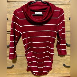 Long sleeved ruffle necked top